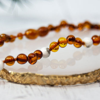 Babyketting van amber en natuursteen - Cognac en Howliet