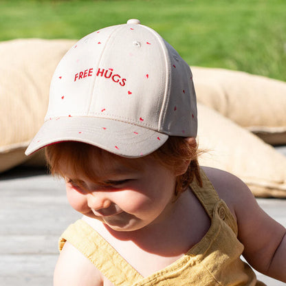 Casquette solaire enfant | Câlins gratuits - beige avec coeurs 