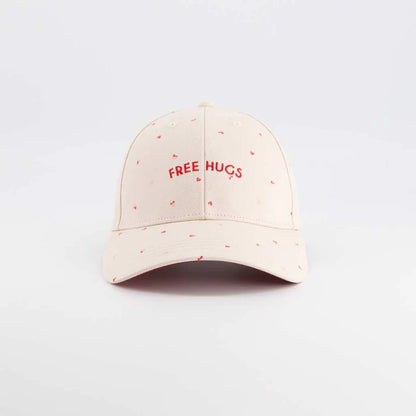 Casquette solaire enfant | Câlins gratuits - beige avec coeurs 